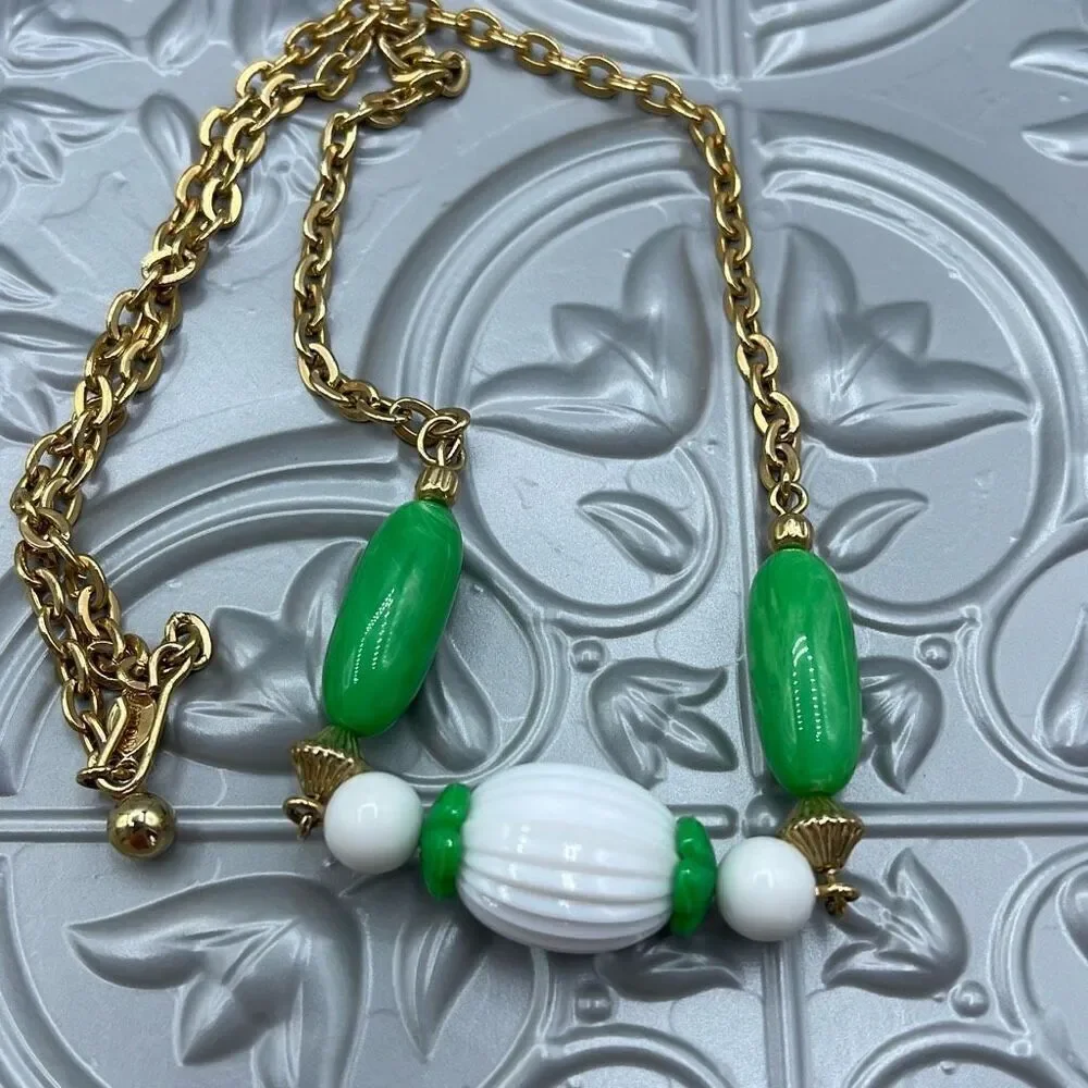 Vintage Avon 1975 “Come Summer” lucite and metal necklace.